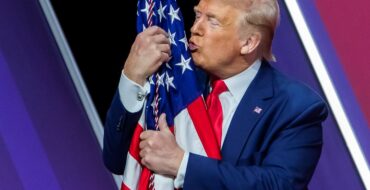 Donald Trump kissing an American flag