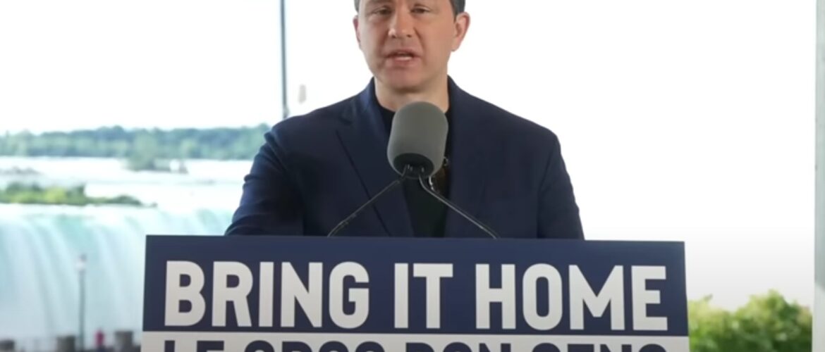 Pierre Poilievre standing at a lectern behind a sign that says "Bring It Home/Le Gros Bon Sens"